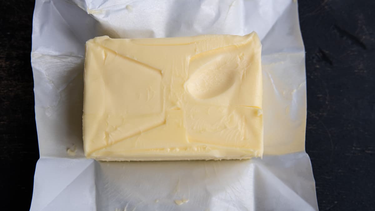 Room temperature butter with finger imprint