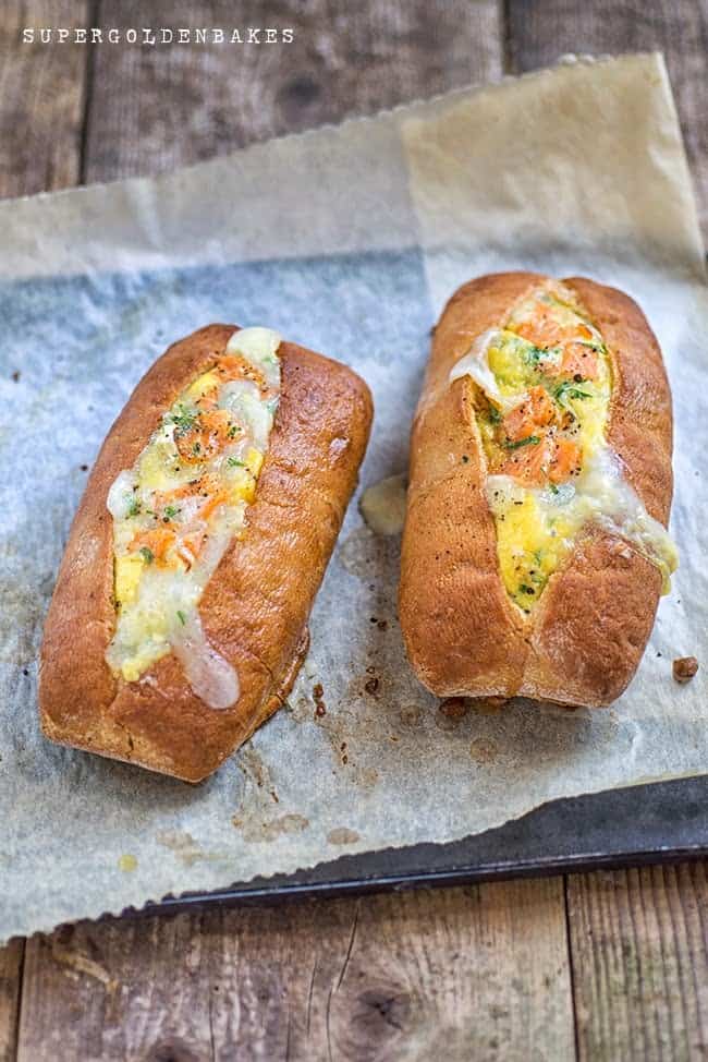 Baked egg boats with salmon and goat's cheese - perfect for breakfast or lunch.