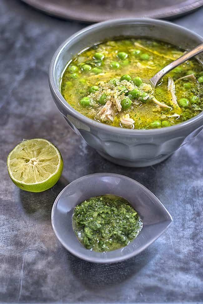 A twist on Peruvian aquadito with cilantro, chicken and quinoa. Quinoa is not traditionally used in aguadito but it makes the soup extra filling and healthy.