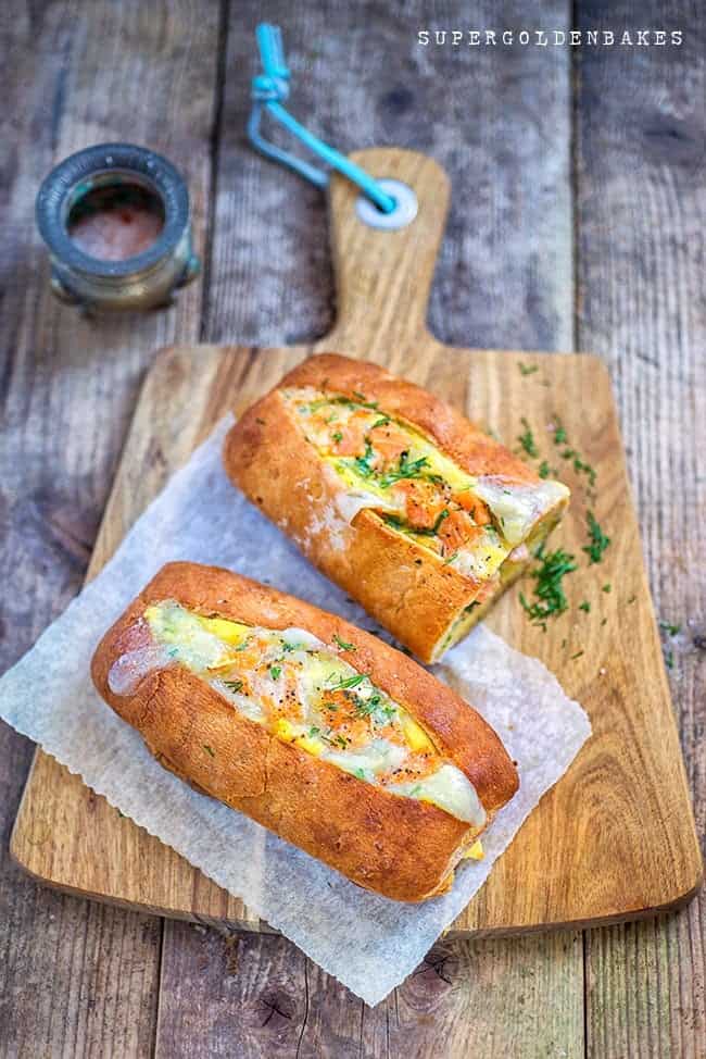 Baked egg boats with salmon and goat's cheese - perfect for breakfast or lunch.