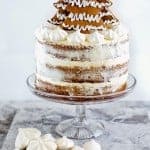 Gingerbread layer cake with cinnamon cream cheese frosting and gingerbread Christmas tree decoration
