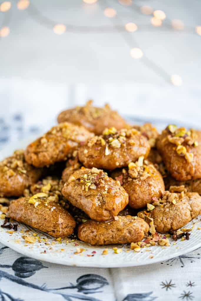 Greek honey cookies with chopped walnuts on a plate