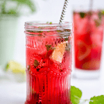 Pink Mojito in an ornate vintage glass with a paper straw