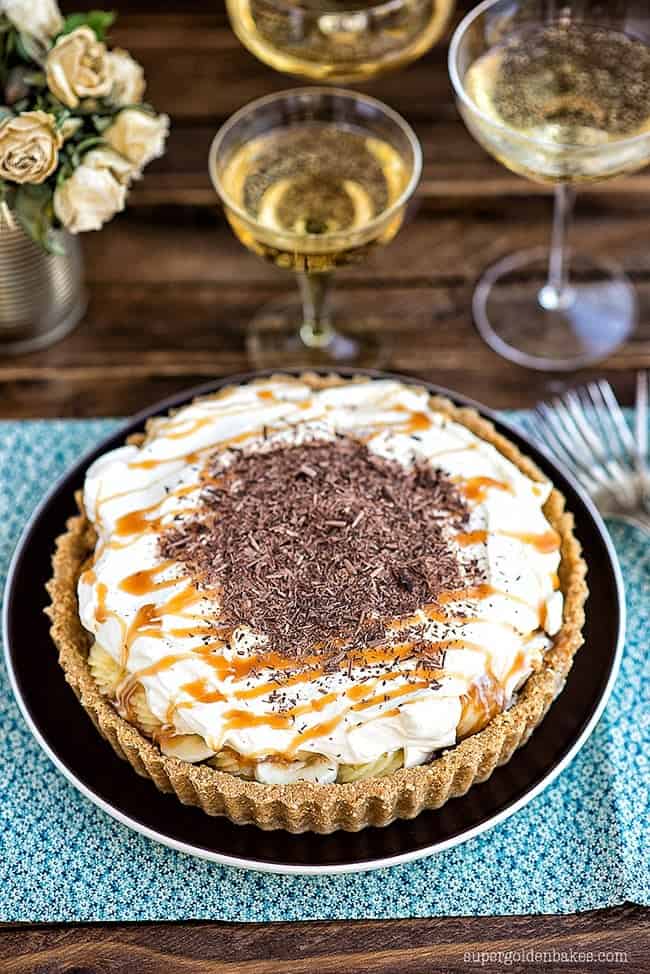 Classic Banoffee pie with whipped cream and chocolate shavings