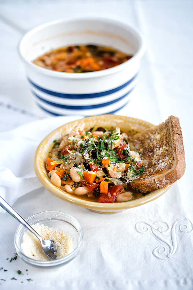 Ribollita is a hearty Tuscan vegetable soup that is made extra filling by the addition of slightly stale bread. Totally delicious and budget friendly.