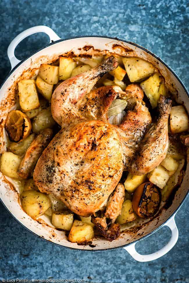 Overhead view of Greek Whole Roast chicken and potatoes