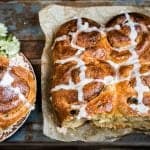 Pillowy soft, studded with raisins and fragrant with spices these irresistible hot cross cinnamon buns are simply perfect for Easter!