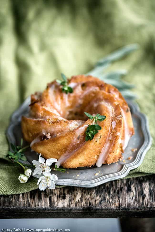 A gorgeously herb-scented lemon, thyme, ricotta and semolina cake soaked in hebal syrup and finished with a simple glaze. Perfect with a cup of herbal tea. 