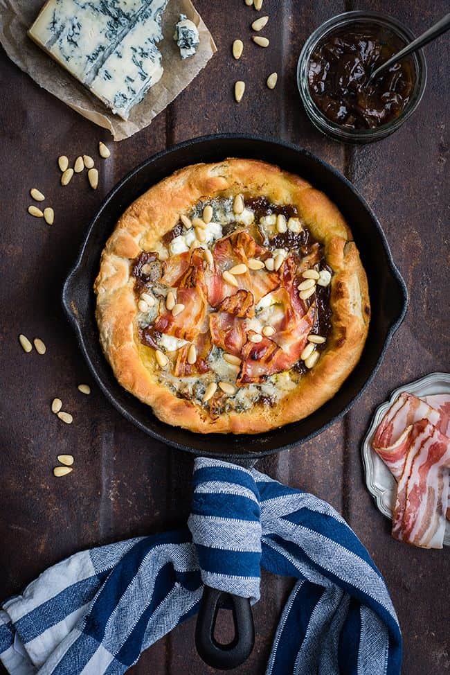 Blue cheese and pancetta skillet pizza with onion chutney