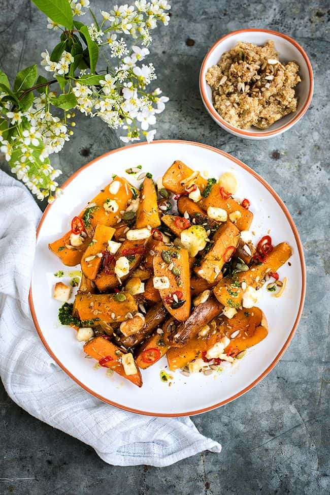 Honey-roasted sweet potato and squash with halloumi and basil oil