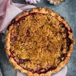 This rhubarb and raspberry pie with crumble topping walks the perfect line between sweet and tangy. Serve with vanilla ice cream for a slice of heaven!