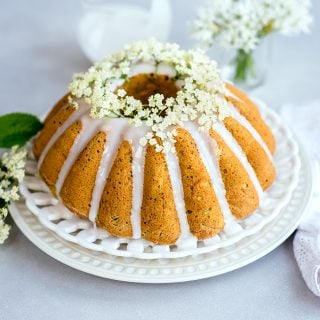 Wonderfully moist zucchini coconut bundt cake with elderflower glaze. Can be baked as a bundt or small loaf cake and it's great for breakfast or snacking.