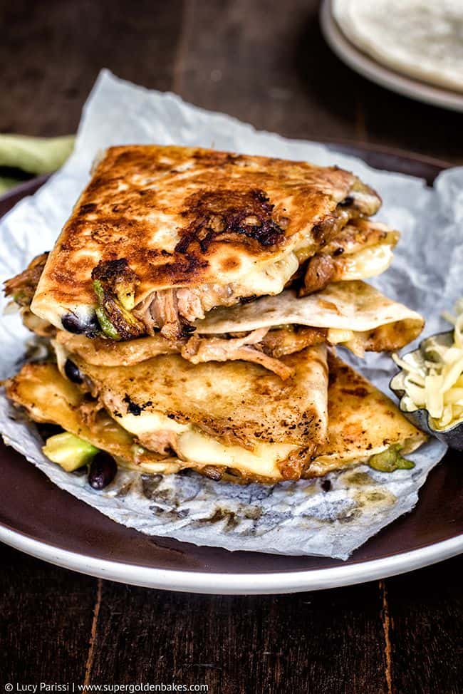 Stack of pulled pork quesadillas on a plate