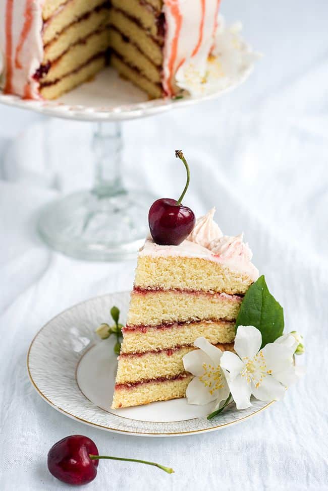 Vanilla layer cake with cherry berry jam and vanilla bean buttercream | Supergolden Bakes