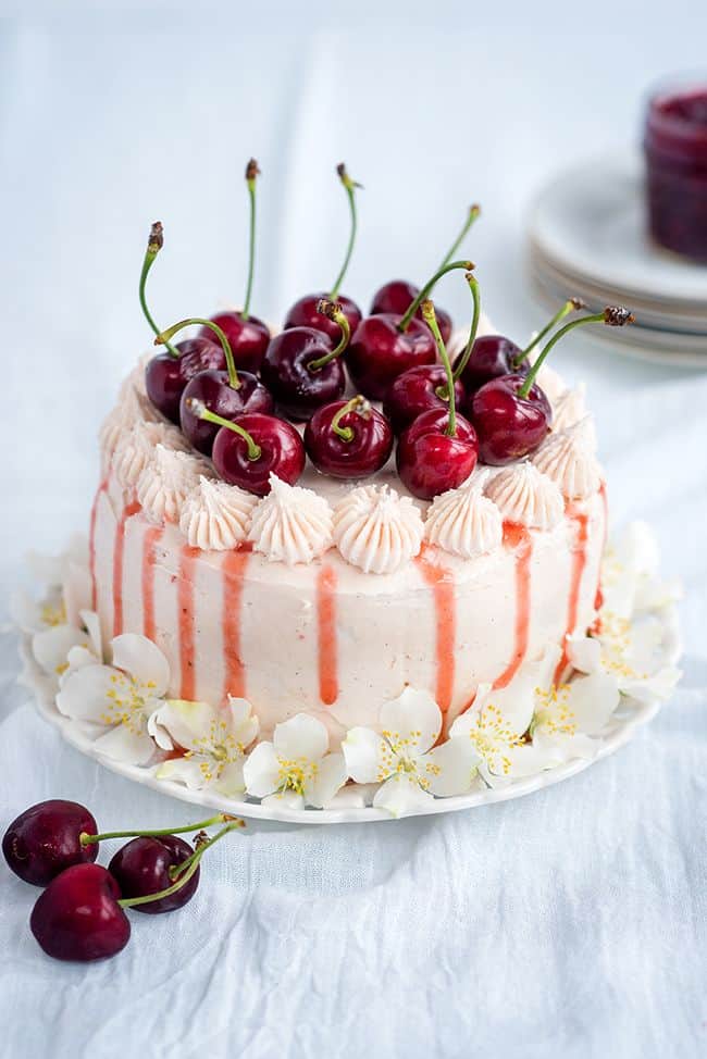 Vanilla layer cake with cherry berry jam and vanilla bean buttercream | Supergolden Bakes