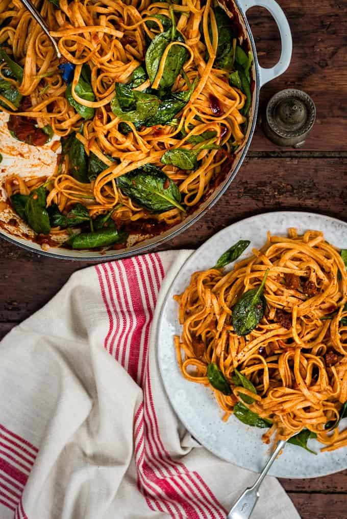 Spicy chorizo and tomato pasta with spinach. Ready in under 30 minutes.