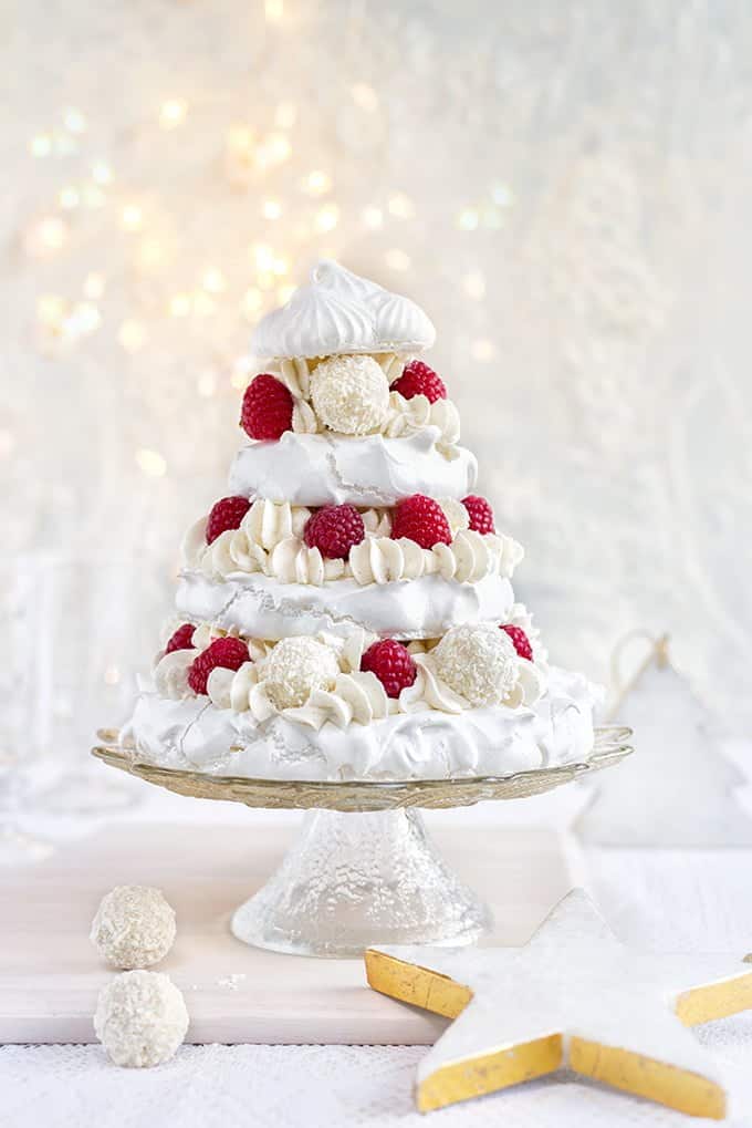 Meringue Christmas Tree with whipped coconut cream, raspberries and white chocolate truffles – a spectacular festive dessert!