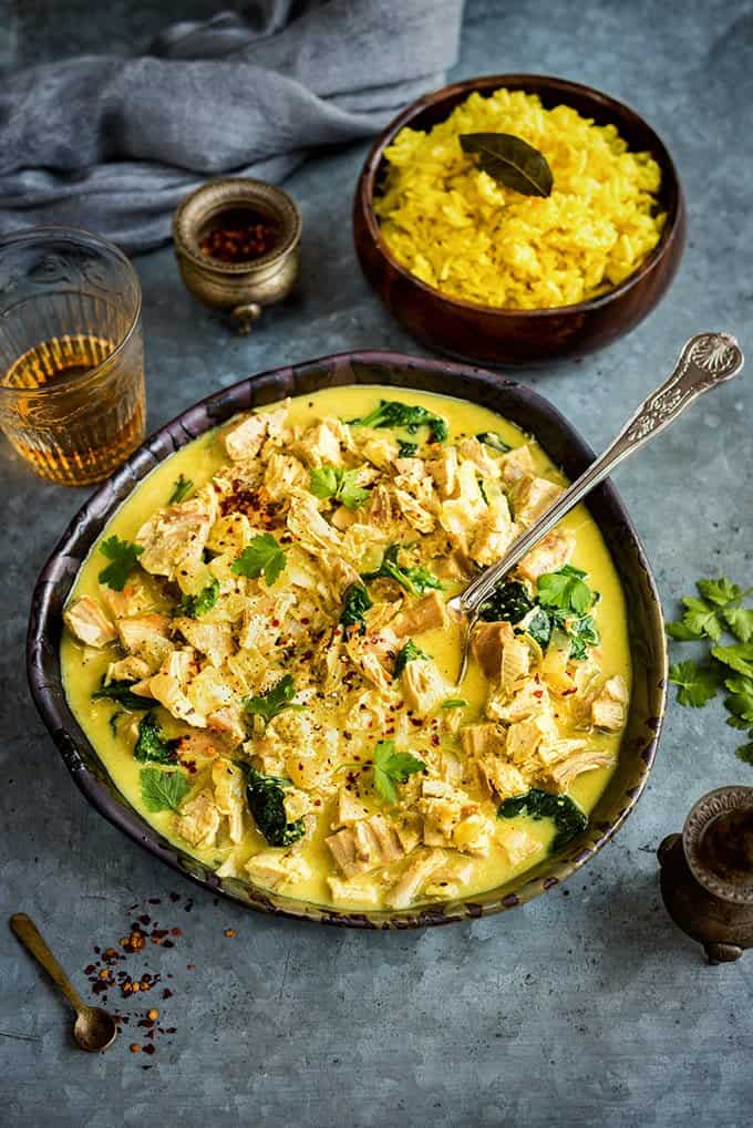 A great way to use your Christmas leftovers - make this crowd pleasing leftover turkey Korma curry to serve with golden rice