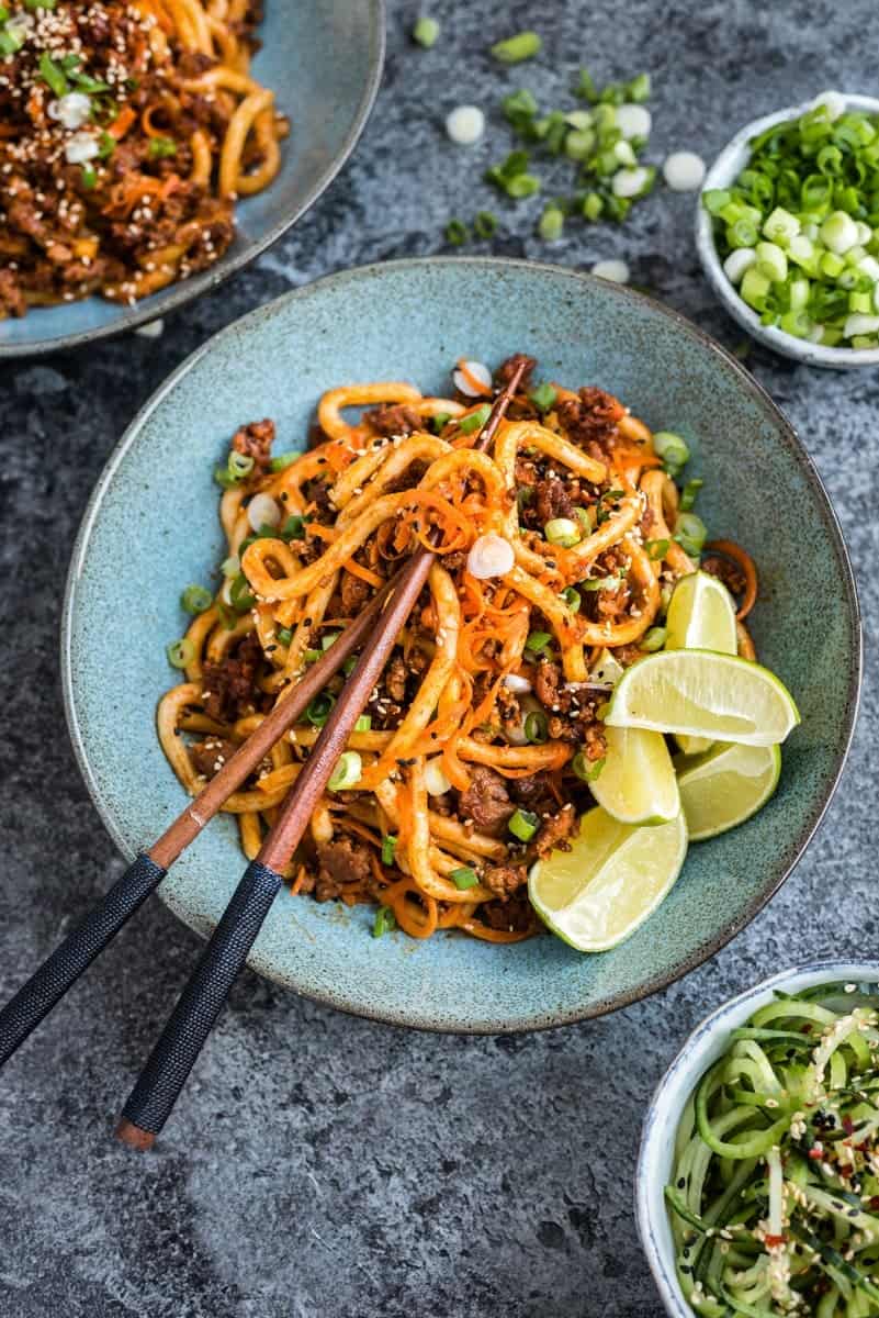 Spicy Korean crispy lamb with udon noodles and spiralized carrots – ready in 30 minutes!