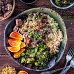 One-pot Brazilian feijoada – rich pork stew with black beans served with spring greens and rice