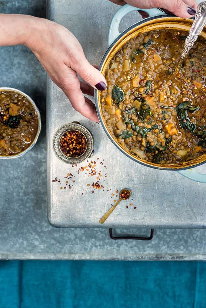 Pot of Hearty Vegan Soup with Lentils, Sweet Potatoes and Kale