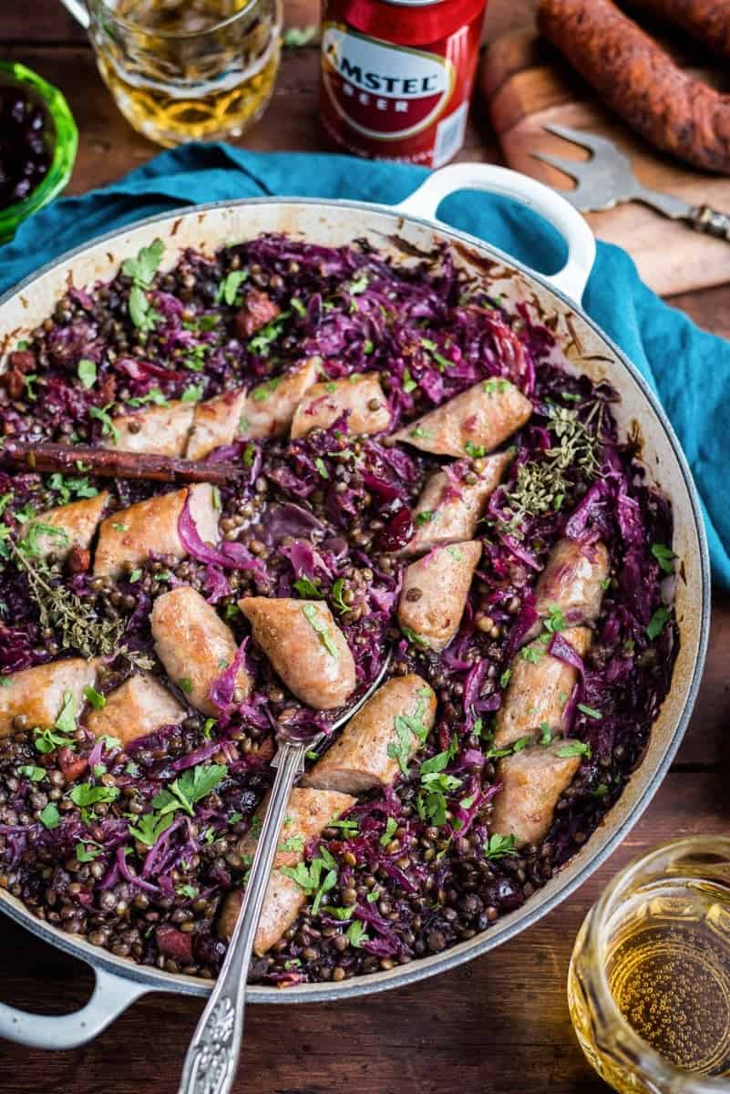 Beer-braised sausages with chorizo, lentils and red cabbage – an easy and satisfying stew that's simply perfect for winter!