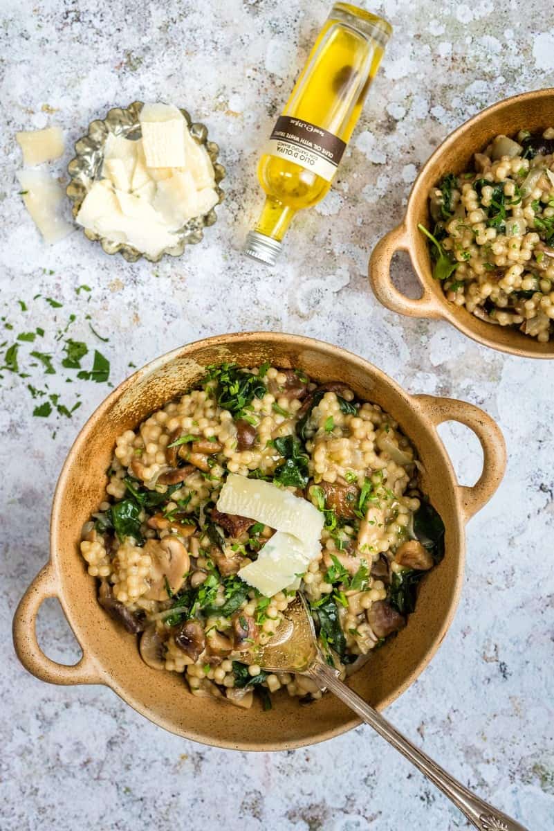 Pearl couscous with mushrooms, spinach and Parmesan