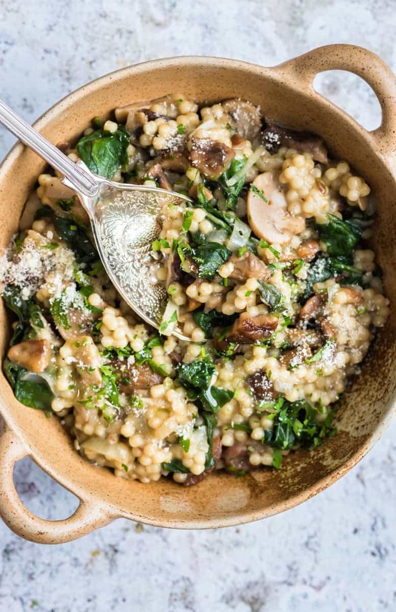 Cheat's risotto with couscous, wild mushrooms, chestnuts, spinach and Parmesan - ready in under 30 minutes!