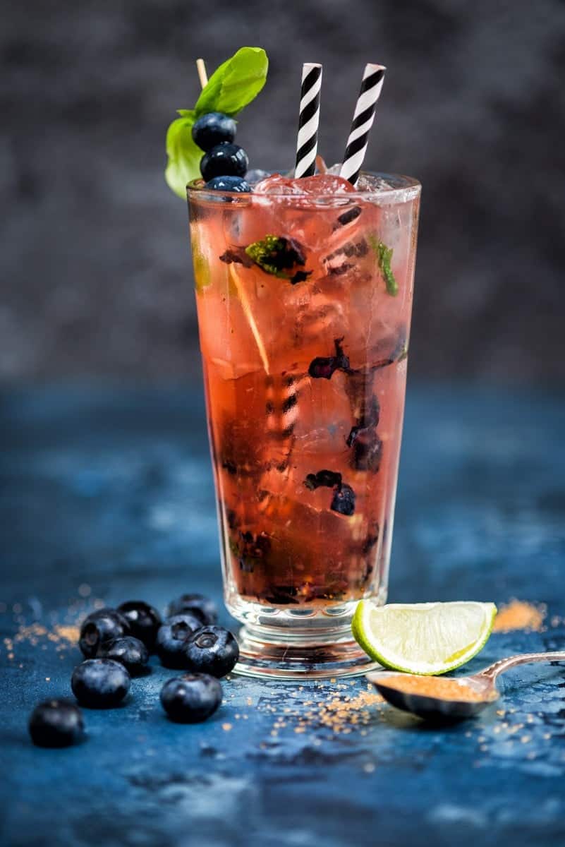 Give your Moscow Mule a spring update with muddled blueberries and basil – refreshing and delicious!