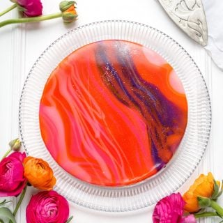 Make this show-stopping mirror glaze white chocolate cheesecake to really impress this Mother's Day!
