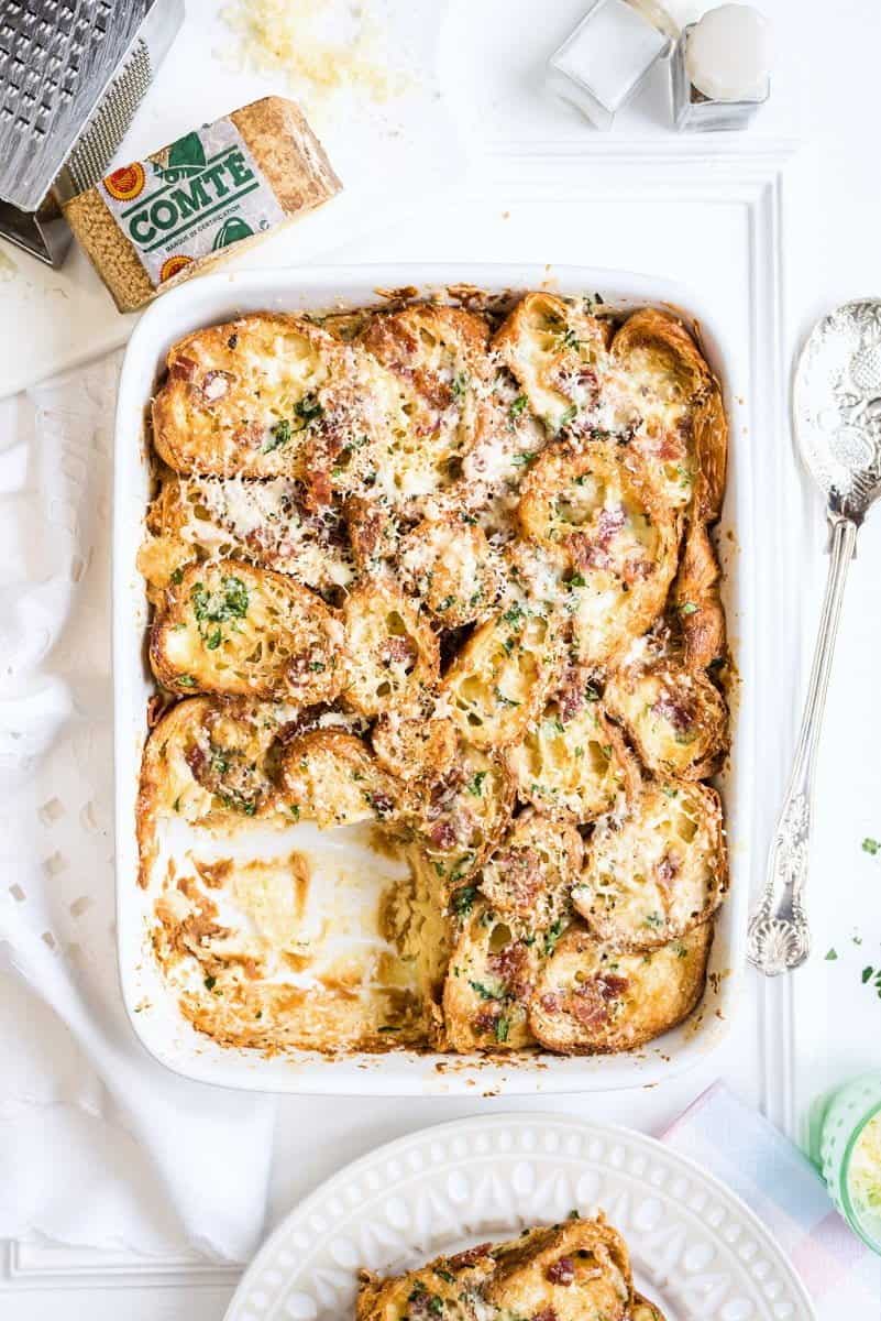 This savoury croissant pudding with Comté cheese and bacon is perfect for feeding a crowd on special occasions!
