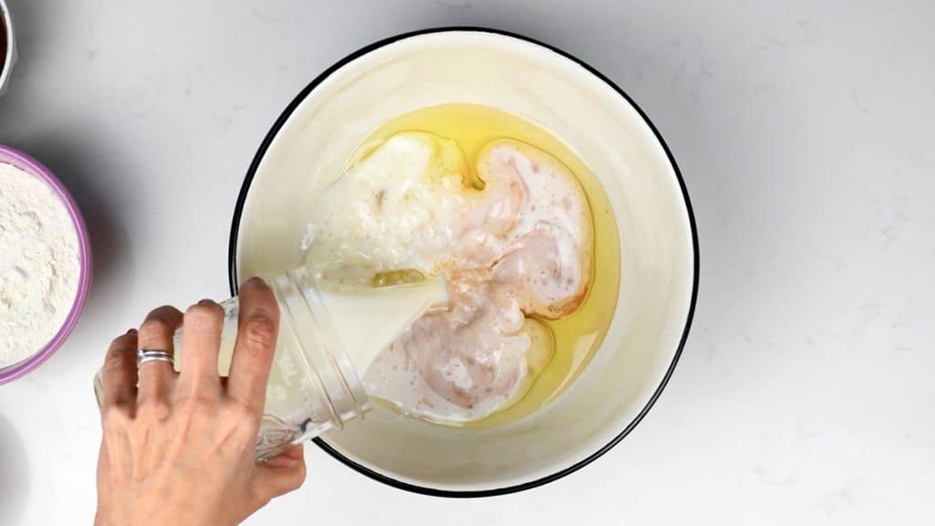 Milk, oil and vinegar in a large mixing bowl