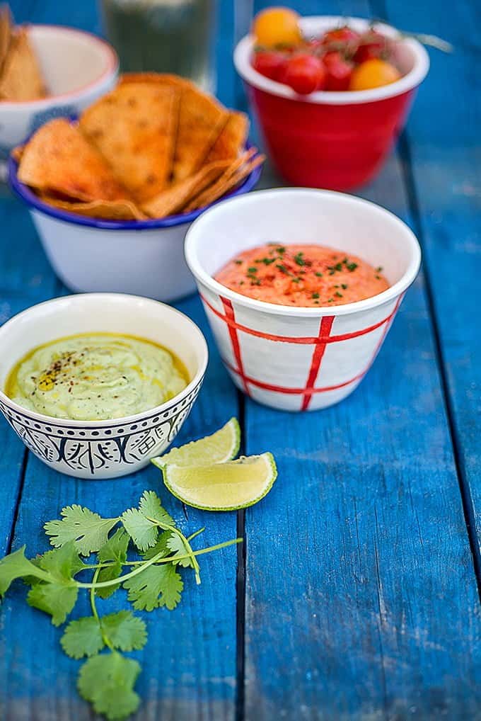 Make sure you keep your guests and family happy while the barbecue is heating up by serving up these two super-easy essential summer dips.
