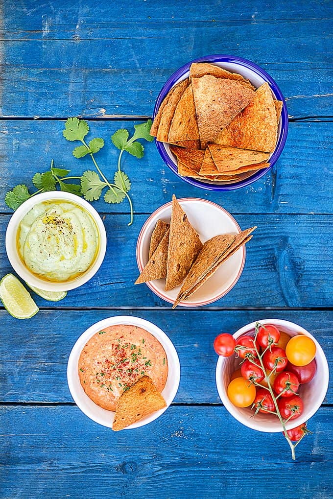 Make sure you keep your guests and family happy while the barbecue is heating up by serving up these two super-easy essential summer dips.