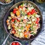 This summery Greek orzo pasta salad with tomatoes and feta will be your go-to side dish for barbecues and is also perfect for picnics and packed lunches.