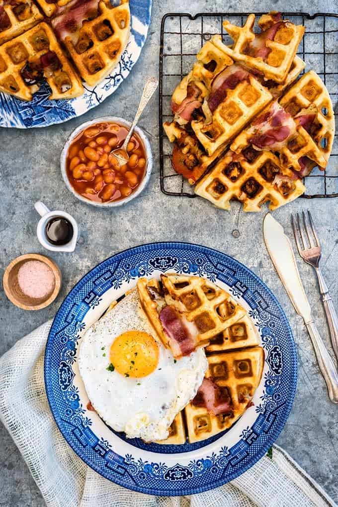 Take savoury waffles to the next level with these insanely delicious egg, cheddar and bacon breakfast waffles. #breakfast #bacon #waffles