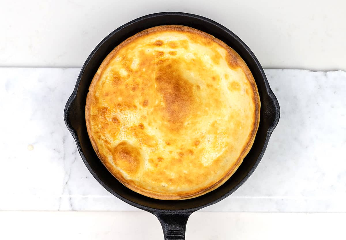 giant Yorkshire pudding wrap in cast iron skillet