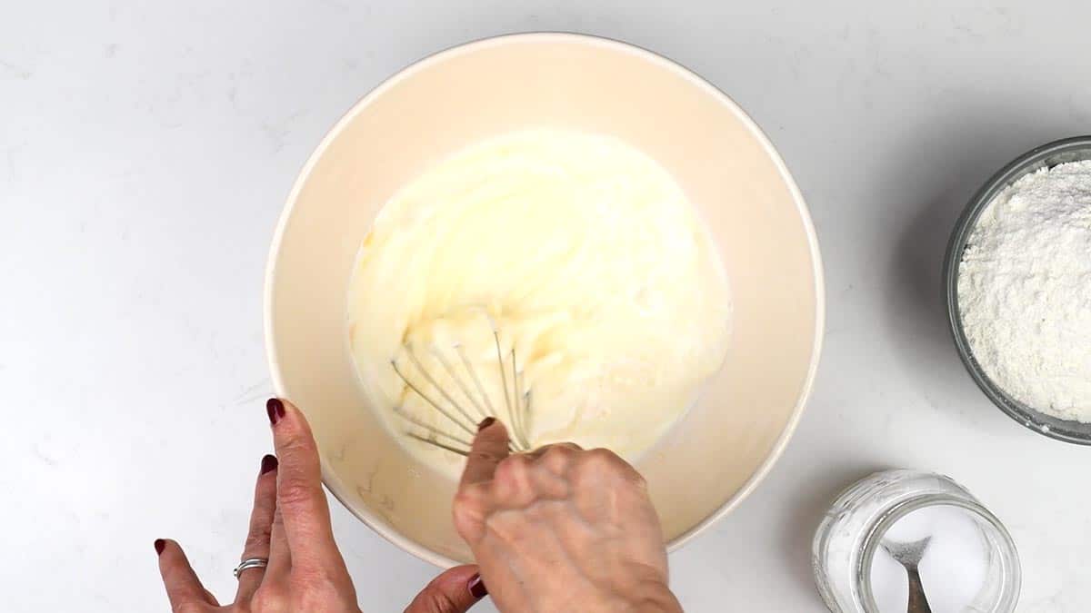 making Yorkshire pudding batter in a mixing bowl
