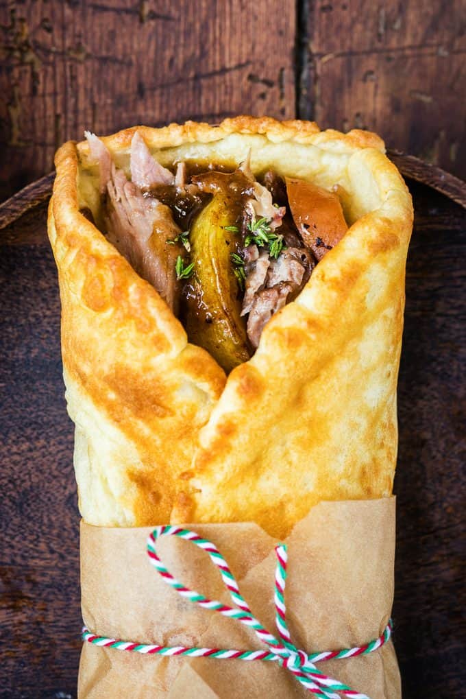 Yorkshire pudding wrap filled with roast lamb, potatoes, carrots and gravy