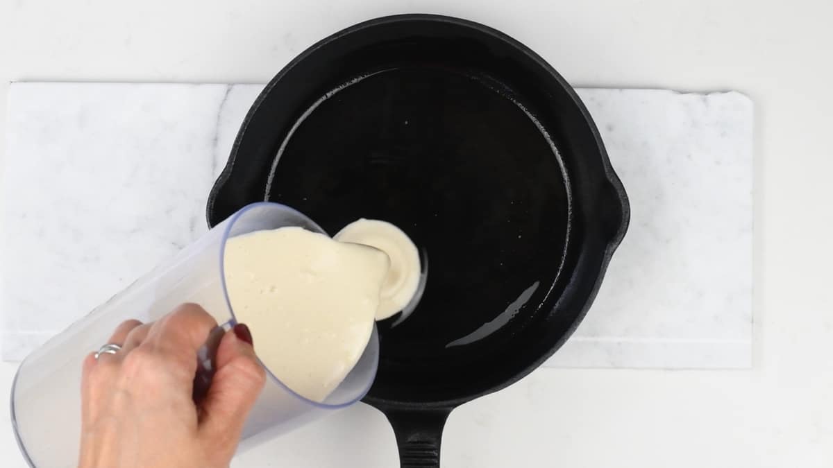 Pouring batter into skillet for Yorkshire pudding wrap