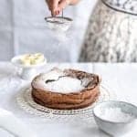 Gluten-free hazelnut torte with white chocolate praline ice cream
