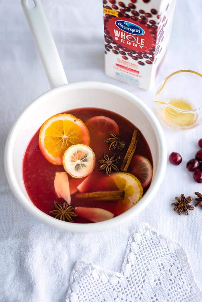Add lemon and orange slices, ginger, cloves and cinnamon to Ocean Spray Whole Berry juice to create a wonderful virgin mulled cranberry punch