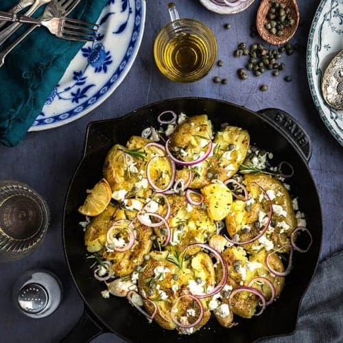 Make these quick smashed Greek potatoes with feta and rosemary whenever you need a delicious side dish in a hurry... or add some protein and turn it into a main.