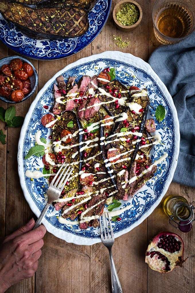 Griddled lamb steaks with sumac roasted eggplant, tomatoes and couscous – a quick and colourful dish that's packed with deliciousness