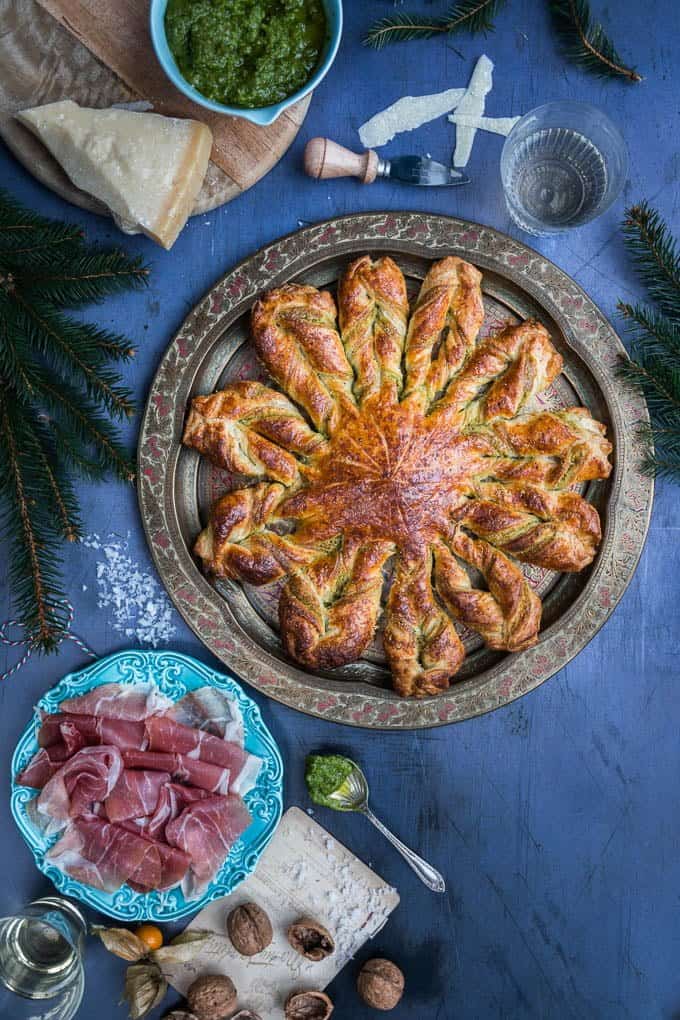 This delicious puff pastry snowflake filled with walnut pesto makes an impressive appetiser and is perfect for serving at parties.