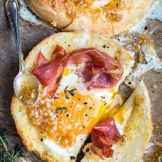 Make eggs-in-a-hole in the oven using bagels for a fuss-free delicious breakfast or brunch.