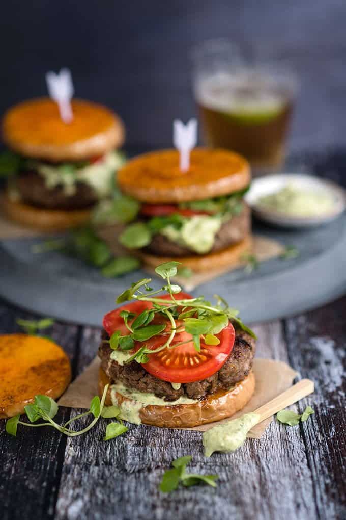 Use butternut squash slices instead of bread in these delicious Greek lamb burgers – a lower carb option that also eliminates the need for fries!