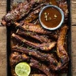 Sticky Korean pork ribs in tray overnead view