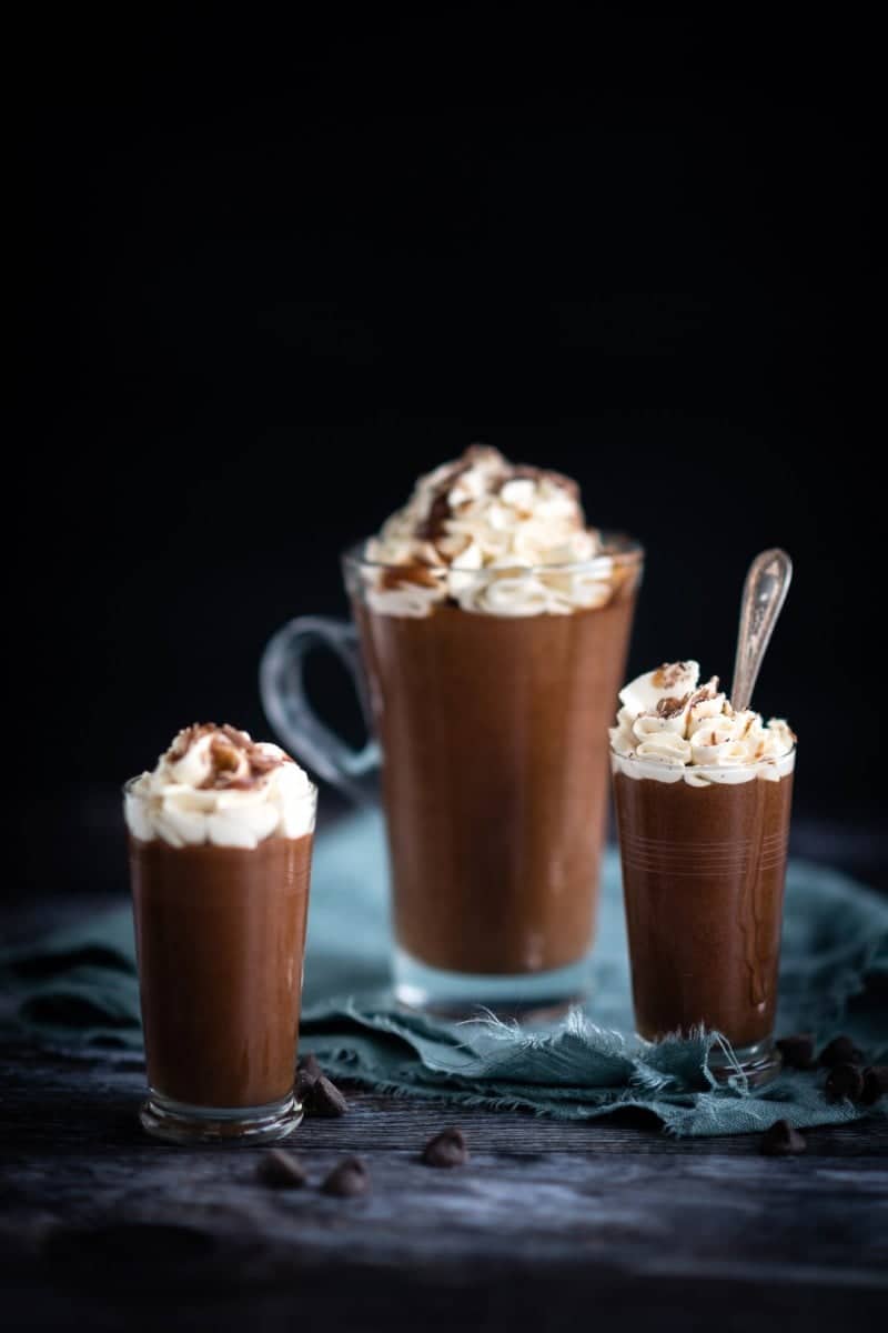 Velvety Baileys Irish cream chocolate mousse topped with whipped cream and chocolate sauce