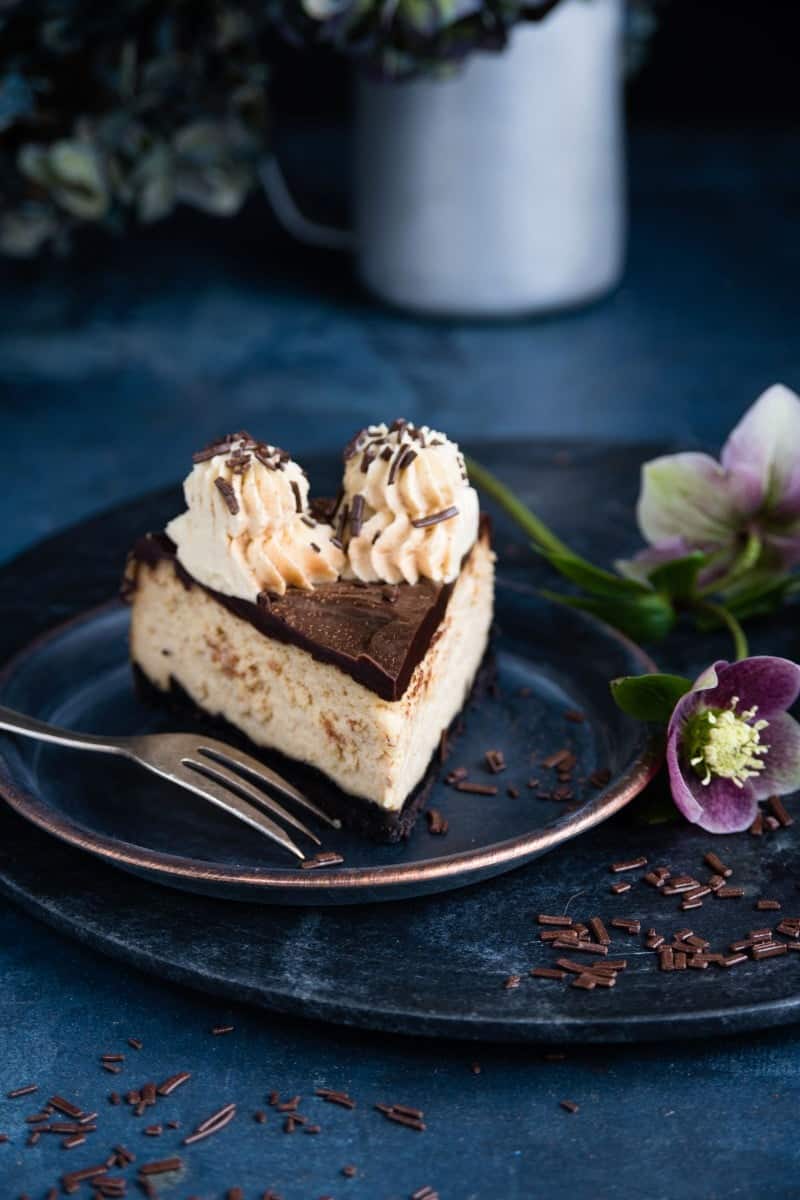 Slice of peanut butter and caramel cheesecake
